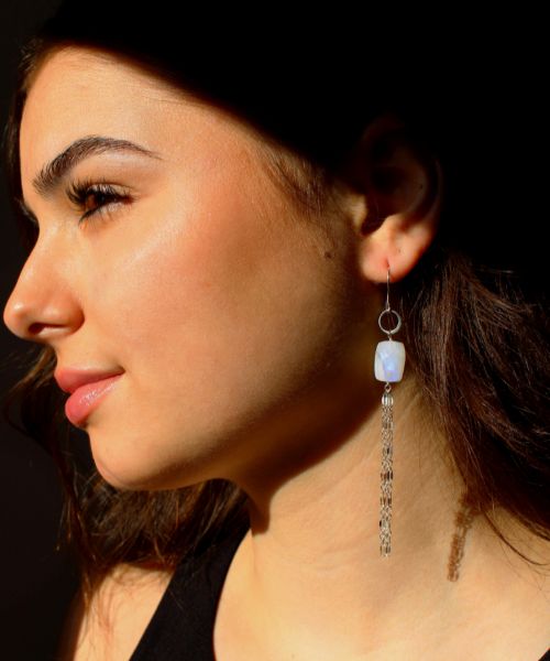 gemstone tassel earrings on model