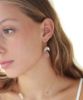 half moon and gem earrings on model
